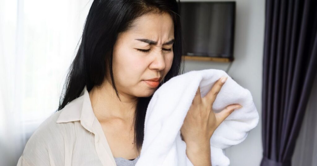 Understanding the Causes of Musty Smell in Clothes